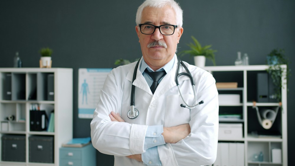 A doctor in his clinic